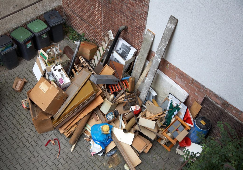 Pile of junk outside a house